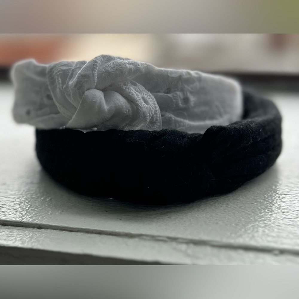Women’s set of two headbands, one white eyelet, one black fabric